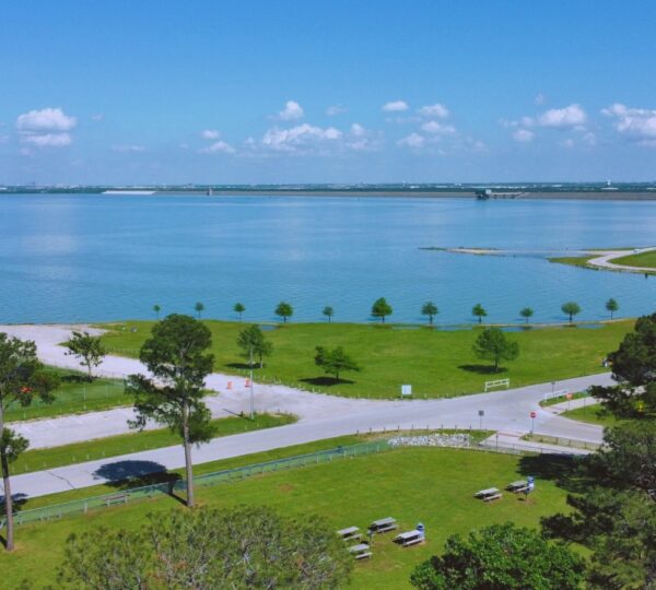 Aerial Shot in Dallas, Texas of lake near local park